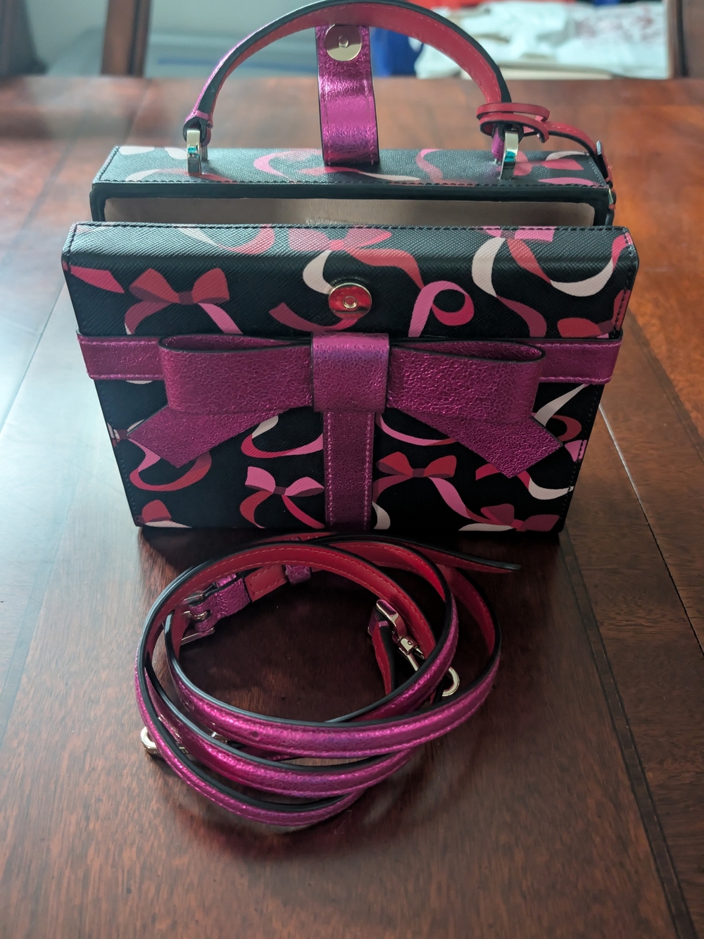 kate spade Black Satchel with Metallic Pink Bow Accent